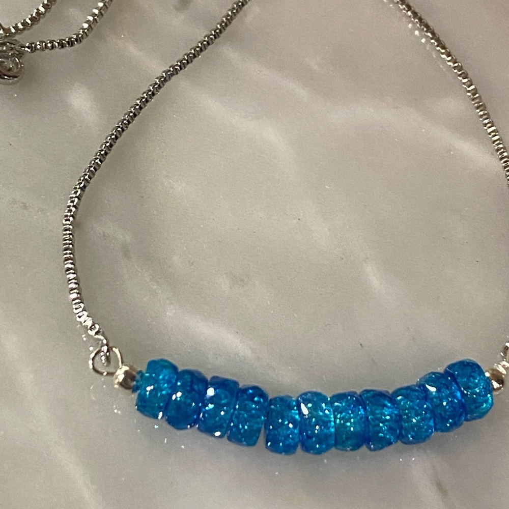 Electric blue polished bead bracelet